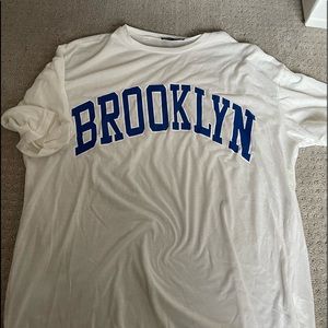 Shein, Brooklyn white oversized t-shirt.